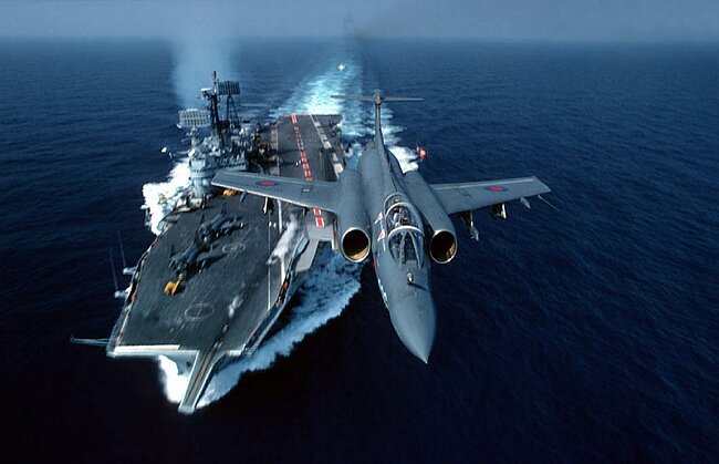 HMS Ark Royal with Buccaneer aircraft taking off.