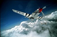Close head-on shot of Mustang P 51 above cloud for Smirnoff vodka.