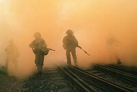 RAF Regiment on exercise in Germany using smoke grenades.